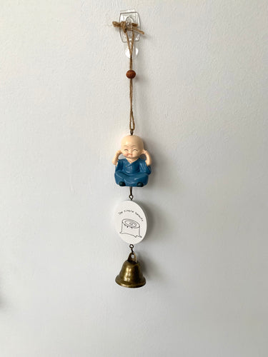 Hanging Buddha with a Bell.